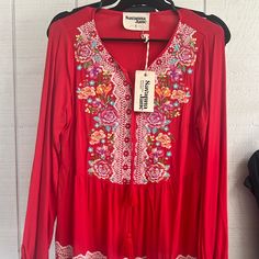 Beautiful Red Long Sleeved Embroidered Top Spring Long Sleeve Top With Embroidered Hem, Spring Embroidered Long Sleeve Top With Hem Detail, Spring Embroidered Long Sleeve Top, Red Embroidered Long Sleeve Top For Fall, Red Floral Embroidered Top, Red Embroidered Top With Embroidered Hem, Red Long Sleeve Blouse With Floral Embroidery, Red Bohemian Top With Embroidered Hem, Bohemian Red Tops With Embroidered Hem