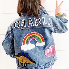 VARSITY Letter Custom Denim jacket.. is a MUST have for the coolest kids ! - personalize with name or initials - add patches for their personality ! *Choose 1 large patch : -Rainbow  -Evil Eye ( blue) -hamsa hand - LARGE unicorn -ICE CREAM Cone - Heart SUNGLASSES *Choose 2 Smaller patches : - Shamrock -pink heart - red heart - Sequin star - daisy flower  - smiley face  - smaller scale mermaid  - Gold crown  -Peace sign -smiley face Oversized custom denim for all their tiny little trinkets ! Plea Varsity Patch Ideas, Customizable Denim Jacket For Fall, Customizable Long Sleeve Denim Jacket, Customizable Denim Jacket, Customizable Denim Outerwear For Fall, Cute Fall Outerwear, Customizable Cute Fall Outerwear, Trendy Customizable Long Sleeve Denim Jacket, Customizable Long Sleeve Denim Outerwear