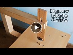 a video demonstrating how to use a jig saw blade guide on a wooden table