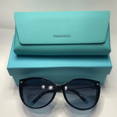 Tiffany Sunglasses Tf4178 8001/9s. Size 57-16 140 Temple Length. Black Plastic Frame Front With Metal Temples And Tiffany Blue Details On Temples As Shown On Pictures. Beautiful Frame. Elegant Silver Cat Eye Sunglasses, Luxury Silver Cat Eye Sunglasses, Elegant Silver Sunglasses With Tinted Lenses, Elegant Silver Cat Eye Sunglasses With Gradient Lenses, Elegant Silver Cat Eye Sunglasses For Evening, Elegant Silver Sunglasses For Formal Occasions, Luxury Glass Cat Eye Sunglasses, Elegant Black Cat Eye Sunglasses For Formal Occasions, Elegant Sunglasses With Gradient Lenses