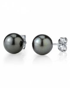 Add to your mysterious appeal with one of our exquisite pairs of 9mm Tahitian South Sea Pearl Stud Earrings, available in a variety of mesmerizing hues. Paired with a classic pearl necklace or pearl pendant, our elegant pearl earrings are designed to elevate your day-to-night look to sophisticated glam levels. From the dark and enigmatic almost-black shades to the shimmery green and from the warm tones of bronze to the striking silver, Tahitian South Sea pearls carry an exotic aura, perfectly depicting the beauty of their lush, rich origins: the salt waters of French Polynesia. South Sea Pearl Necklace, Tahitian Pearl Earrings, Popular Earrings, Black Pearls, Cartilage Earrings Hoop, Sea Pearl, Real Pearls, South Sea Pearls, Cross Earrings