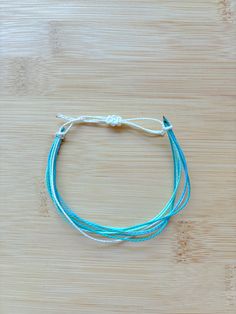 preppy summer pura vida wax string bracelet!! Trendy Blue Friendship Bracelets With Adjustable Cord, Trendy Blue Adjustable Cord Friendship Bracelets, Trendy Blue Friendship Bracelet, Blue Summer Friendship Bracelets For Everyday, Adjustable Blue Friendship Bracelets For Vacation, Blue Bohemian Friendship Bracelets For Everyday, Minimalist Blue Bracelets For Summer, Blue Summer Friendship Bracelets, Minimalist Blue Bracelet For Summer