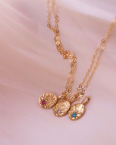 birth flower necklace, birthstone necklace, dainty necklace, gold necklace  Flowers: January: Carnation February: Violet March: Daffodil April: Daisy May: Lily or the valley June: Rose July: Water Lily August: Gladiolus September: Morning Glory  October: Marigold November: Chrysanthemum  December: Narcissus cubic zirconia birthstones: January: garnet  February: amethyst  March: aquamarine  April: clear diamond May: emerald  June: Alexandrite July: Ruby  August: Peridot  September: Sapphire  Octo Dainty Flower Charm Necklace With May Birthstone, Dainty Birthstone Flower Pendant Charm Necklaces, Yellow Gold Birthstone Charm Necklace With Flower Pendant, Delicate Birthstone Charm Necklace For Mom, Personalized Delicate May Birthstone Necklace, Delicate Gold May Birthstone Necklace, Delicate Personalized May Birthstone Necklace, Delicate Gold Necklace With May Birthstone, Delicate Gold Necklace For May Birthstone