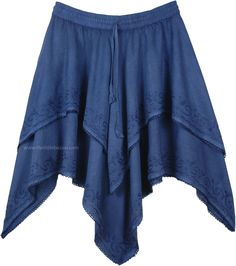 Denim blue high low handkerchief hem skirt stitched in two full layers of soft and flowing rayon fabric. A fun and flirty western style skirt, from rodeo's to barn dancing, it fits in everywhere. It's gorgeous hemline is framed by abstract embroidery, creating an eye-catching masterpiece. The perfect skirt for the on-the-go woman due to its versatile nature, you can wear this skirt with a simple, light blouse in the summer, or leggings, a sweater, and boots in winters. Length: 26" - 36"; Waist: Bohemian Asymmetrical Cotton Skirt, Flowy Cotton Skirt With Handkerchief Hem, Fitted Peasant Tiered Skirt Bottoms, Peasant Style Fitted Tiered Skirt, Fitted Peasant Style Tiered Skirt, Bohemian Cotton Skirt With Handkerchief Hem, Bohemian Flowy Asymmetrical Skirt, Peasant Style Skirted Bottoms For Spring, Peasant Skirted Bottoms For Spring