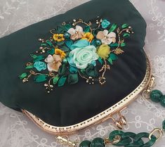 Handmade. In a single copy.  Velvet fabric, green. Embroidery with silk ribbons and beads.  Handle with large green beads.  Size: width 27 cm, height 20 cm, handle height 18 cm. Vintage Green Shoulder Bag For Party, Green Vintage Shoulder Bag For Party, Green Rectangular Shoulder Bag With Floral Embroidery, Elegant Green Bag With Floral Embroidery, Elegant Green Bags With Floral Embroidery, Traditional Green Evening Bags, Green Bags With Floral Embroidery As A Gift, Embroidered Green Shoulder Bag As Gift, Embroidered Green Shoulder Bag For Gift