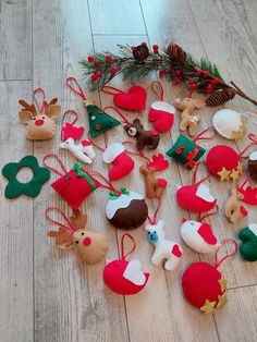 christmas ornaments are laid out on the floor