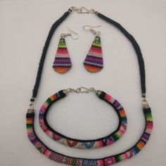 Set Of Bracelet Earrings And Necklace Woven In Multicolored Blanket These Earrings Were Made By Peruvian Artisans From Cusco, Using Ancient Handmade Cloaks With Natural Pigments These Earrings Are Handmade By Peruvian Artisans Andean Community Handmade Adjustable Rainbow Jewelry, Multicolor Dangle Jewelry For Gifts, Handmade Multicolor Adjustable Jewelry, Multicolor Adjustable Handmade Jewelry, Fair Trade Adjustable Bracelets, Fair Trade Adjustable Jewelry Bracelet, Fair Trade Bracelet Jewelry For Festivals, Fair Trade Adjustable Bracelet, Bohemian Rainbow Bracelet Jewelry