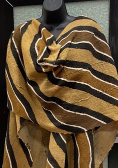 A beautiful abstract Mudcloth shawl. This shawl is unisex and is great for layering. This is a wearable art piece. A medium weight fabric. Don't delay order yours today. Visit evelyncreation.com Throwback Outfits, African Hats, African Skirts, Kente Cloth, Ethnic Outfits, Gift Of Time, Fall Skirts, Coat Design, African Fabric