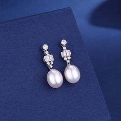 Royal-inspired Elegance: Freshwater Pearl Drop Earrings – Emulate Kate Middleton's Iconic Style" Description: Indulge in the refined beauty of our Freshwater Pearl Drop Earrings, reminiscent of the classic design favored by Kate Middleton. These stunning earrings feature gleaming freshwater pearls in a captivating teardrop shape, exuding timeless elegance. Crafted with meticulous attention to detail, each earring is delicately suspended from 925 sterling silver hooks, adding a touch of sophistic Royal Earrings, Celine Earrings, Popular Earrings, Freshwater Pearl Drop Earrings, Baroque Pearl Earrings, Gold Pearl Necklace, Royal Design, Gold Pearl Earrings, Freshwater Pearls Earrings