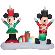 two inflatable mickey and minnie christmas decorations