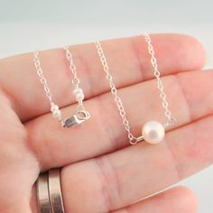 Freshwater Pearl Choker Necklace Floating White Neutral Simple Silver Jewelry With Pearl Charm, Simple Silver Jewelry With Pearl Chain, Simple Pearl Drop Necklace For Gifts, Minimalist Silver Pearl Charm Necklace, Simple Pearl Necklace Gift, Simple Pearl Chain Necklace As Gift, Simple White Pearl Necklace As Gift, Simple Pearl Necklace For Gift, Silver Pearl Necklace With Delicate Chain