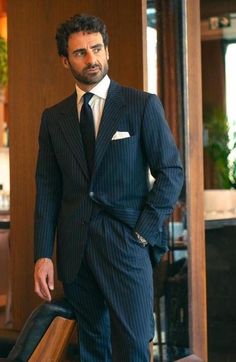 Men's Double Breasted 2 Piece Suit Navy Blue Pin Stripe Suit Business Wear Work Wear Office Wear Peak Lapel Suit For Men. This is a Two Piece Suit crafted from high quality fabric and imported materials. Our products are handcrafted by experienced tailors who make sure the that the stitching is precise, lining is proper and the overall product is sturdy enough to not go out of shape for more than a few years. Also all our products have extra margins in their length, sleeves, sides so it's easily Pinstripe Suit With Suit Collar For Office Wear, Long Sleeve Business Suit Sets, Long Sleeve Business Suiting Sets, Business Suiting Fabric Sets With Long Sleeve, Classic Pinstripe Suits For Office Wear, Pinstripe Business Suits With Long Sleeves, Pinstripe Suits With Long Sleeves For Business, Pinstripe Long Sleeve Business Suits, Classic Blue Office Wear Sets