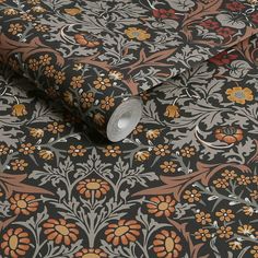 an image of a wallpaper with flowers and leaves on the surface in grey, orange, yellow and red colors