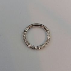 Septum Clicker / Nose ring 8mm-16g White diamonds 100% Natural diamonds G - VS2 - 1.25mm - 0.15ct Can make clicker without a button Inner Diameter; 6mm,8mm,10mm Septum ring:12g,14g,16g.18g Materials :14K Solid gold Options gold : 18k solid gold yellow god,rose gold,white gold Small Hoop White Gold Diamond Rings, Diamond White Halo Hoop Jewelry, 14k White Gold Round Septum Ring, White Gold Diamond Rings With Small Hoop, Silver Small Hoop Jewelry With Halo Detail, Vs Clarity White Gold Hoop Jewelry, Elegant Septum Ring With Halo, Silver Diamond Septum Ring, Elegant Silver Septum Ring With Halo