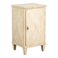 a white marble cabinet with wooden legs