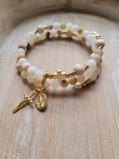 This natural stone, gold plated stainless steel modern Rosary Bracelet is inspired by a beautiful and comforting Bible passage from our Lord Jesus Christ. With the life we live today full of distractions, anxiety, and fears, we need to remember what Jesus said to us through John 14:27.  Jesus says about peace, "Peace I leave with you; my peace I give you. I do not give to you as the world gives. Do not let your hearts be troubled and do not be afraid." Stay in prayer and intercede your prayers t Christian Jewellery, Rosary Ideas, Frosted Flower, Flower Jade, Christian Bracelets, My Peace, Immaculate Heart, Faith Jewelry, Lord God