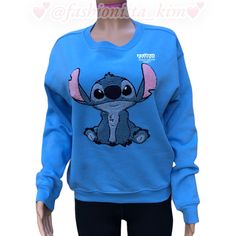 Stitch Disney Sweater Hoody New With Tags Blue Long Sleeve Hoodie With Character Print, Blue Character Print Hoodie Sweatshirt, Blue Hoodie With Character Print, Blue Hooded Sweatshirt With Character Print, Blue Hoodie Sweatshirt With Character Print, Cute Blue Fleece Hoodie, Blue Cartoon Print Hoodie For Streetwear, Blue Hooded Sweatshirt With Cartoon Print, Blue Cartoon Print Sweatshirt For Streetwear