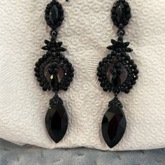 These Are Elegant And Dramatic Jet Black Crystal Earrings-Perfect For You Next Black Tie Event. Not Only Are These Stunning But They Are Comfortable And Popular In Our Boutique. 3” Surgical Steel Posts Black Enamel Setting Austrian Crystals 44e Black Dangling Earrings, Elegant Black Beaded Chandelier Earrings, Glamorous Black Crystal Earrings, Black Beads Drop Earrings For Evening, Black Beaded Drop Earrings For Evening, Crystal Earrings For Evening, Black Beaded Dangle Earrings For Party, Evening Black Beaded Drop Earrings, Black Dangle Chandelier Earrings For Party