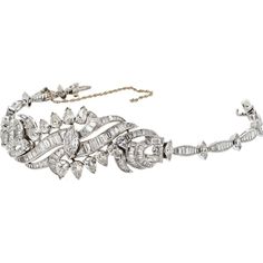 Journey through the legacy of luxury, where heritage meets modernity in the Platinum 25 Carat Circa 1950's Diamond Bracelet. Step into a time capsule of elegance and sophistication with this timeless piece, crafted in platinum to reflect the opulence of the 1950s era. Measuring a graceful 8.25 inches in length and boasting a substantial width of 1 inch in the center, this bracelet commands attention with its luxurious presence on the wrist.Adorned with a mesmerizing collection of marquise cuts, pear cuts, baguette cuts, and round cuts, the diamonds on this bracelet create a symphony of sparkle and brilliance. Each diamond is meticulously set to showcase the craftsmanship and design aesthetic of the 1950s, a period renowned for its attention to detail and artistry.Whether you're a connoisse Diamond Birthstone, Platinum Metal, Time Capsule, Design Aesthetic, Metal Bracelets, Estate Jewelry, The 1950s, Timeless Pieces, American Vintage