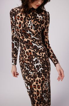 A wrapped bodice adds a grace note to a knit dress patterned in a fierce print. Hidden back-zip closure Surplice V-neck Long sleeves 87% viscose, 10% nylon, 3% spandex Dry clean Imported Fitted Leopard Print V-neck Midi Dress, Leopard Print Stretch V-neck Dress, Fitted Leopard Print Long Sleeve Midi Dress, Fitted Leopard Print Midi Dress With Long Sleeves, Fitted Long Sleeve Leopard Print Midi Dress, Leopard Print Bodycon Dress For Fall, Knit Dress Pattern, Wrap Front Dress, Jungle Cat