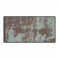 an old rusty metal plate with rust on the side and brown paint splattered over it