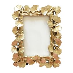 an ornate gold frame with flowers on the front and bottom, against a white background