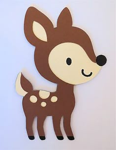 a paper cut out of a baby deer