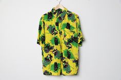 Vintage Japan y2k colorful all over print shirt Made by X NY Press Size Large listed Across chest - 22.5 inches Length - 29 inches 100% Rayon Great condition cai01 Green Graphic Print Camp Shirt For Spring, Spring Green Camp Shirt With Graphic Print, Green Floral Print Short Sleeve Hawaiian Shirt, Green Hawaiian Shirt With Graphic Print For Spring, Spring Hawaiian Shirt With Graphic Print In Green, Spring Hawaiian Shirt In Green With Graphic Print, Green Collared Shirt With All Over Print, Green Hawaiian Shirt With All Over Print, Spring Green Hawaiian Shirt With Graphic Print