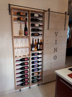 a wine rack filled with lots of bottles