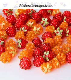 some red and yellow gummy bears with leaves on them