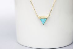 Lovely and tiny gold framed turquoise marble stone triangle pendant necklace is great to wear for everyday or special occasions . Materials Gold plated Turquoise stone Size Charm size : 10 mm Chain Length : 16 '' ( AS PICTURED ) You can CHOOSE your chain length 15 - 18 INCHES before check out ! * necklace sizes * 15 inches: around neck 16 inches: standard short 17 inches: average length 18 inches: standard long CAUTION - We do not recommend to buy it if you have allergic and sensitive skin - Do Gold Minimalist Turquoise Necklace Gift, Turquoise Triangle Jewelry For Gifts, Turquoise Triangle Jewelry Gift, Dainty Triangle Jewelry For Gifts, Dainty Triangle Jewelry Gift, Turquoise Marble, Modern Necklace, Triangle Pendant, Necklace Simple