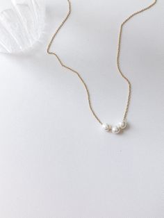 🎯Minimalist style, creating for daily wear, simple but elegant, light-weight slim chain.  * Chain length: 43cm  * Material: Freshwater pearl | 18K gold plated chain ✅[Jewelry Caring Tips] All our gold products are plated with a thick layer of 14K-24k gold giving durable plating at an affordable price. With the look of real gold, plated jewelry is a wonderful and affordable way to add a versatile choice to your jewel box To maintain the appearance, we strongly recommend avoiding water when wearing your piece, wiping them with a soft cloth after wear; keep them in proper storage to prevent oxidation. 💫[About our Packageing] Our Jewelry will be stored and shipped within an Anti Oxidation Zipper Bag along with our designed logo Linen Cotton Bag, well packed within a recycled kraft box, which Everyday White Pearl Chain Charm Necklace, Minimalist White Pearl Necklace With Charm, Minimalist White Pearl Necklace For Everyday, Minimalist White Pearl Necklace For Everyday Wear, Elegant White Charm Necklace For Everyday, Minimalist White Beaded Pearl Necklace, Minimalist Everyday White Pearl Necklace, Minimalist Everyday Charm Necklace With Pearl Chain, Simple Pearl Chain Necklace