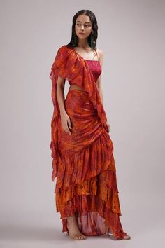 Orange draped saree with floral print and ruffle border. Paired with sequin neckline embroidered padded blouse. - Aza Fashions Aakanksha Singh, Orange Drapes, Saree Gowns, Cotton Sarees Handloom, Draped Saree, Orange Saree, Ruffle Saree, Padded Blouse, Drape Saree