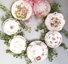 a wreath made out of old china plates