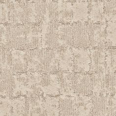 a beige rug with small squares on it