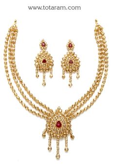 22 Karat Gold Necklace & Drop Earrings Set with Uncut Diamonds & Rubies 
   - 235-DS514 - in 69.200 Grams for USD $8320.39. 
Made in India by Totaram Jewelers Online this product is in Gold - 22 Karat BIS Hallmark 916 KDM Gold  & is an excellent gift for Adult - Women. Ships fully insured with secured guaranteed delivery for free with your order over $250 from New Jersey USA & comes with 30 days exchange policy. Uncut Diamond Necklace, Indian Gold Jewelry, 22k Gold Necklace, Temple Jewelry Necklace, Antique Pins, 22k Gold Jewelry, Black Gold Jewelry, Accesories Jewelry, Gold Jewelry Stores