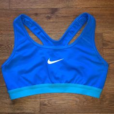 Nike Sports Bra Two Tones Blue With Large White Printed Swoosh Thick Elastic Bands, Great Stretch And Mobility, Mesh And Breathable Material! Great Condition! Looks And Feels Brand New! Women’s Size Small Blue Moisture-wicking Sports Bra For Gym, Blue Racerback Sports Bra For Athleisure, Blue Breathable Sports Bra With Medium Support, Blue Athleisure Racerback Sports Bra, Blue Sports Bra For Running With Medium Support, Blue Sports Bra With Medium Support For Running, Nike Blue Sports Bra For Workout, Blue Breathable Sports Bra For Training, Blue Breathable Sports Bra