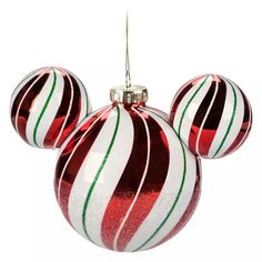 an ornament shaped like mickey mouse's head with red, white and green stripes