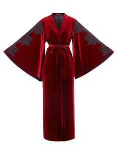 Velvet robe with silk and satin blend lining. Ankle length, wrap-over style, lace embellished sleeves, with two sets of inside ties. One tie is included. Material Composition: polyester 95%, elastane 5% Velvet Robe Dress, Luxury Long-sleeved Traditional Robe, Luxury Long Red Robe, Bridesmaid Robe Burgundy, Burgandy Bridesmaids Robes, Fancy Winter Robes, Luxury Red Ceremonial Kimono, Luxury Lavender Traditional Drape Wear, Modern Witch Robe