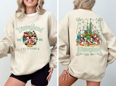 Disneyland Est 1955 Christmas Sweatshirt, Mickey And Friends Christmas Sweatshirt, Christmas Family Sweatshirt, Disneyland Sweatshirt If you are looking for soft, comfortable, premium sweatshirts and hoodies you are in the right place! A B O U T   O U R   P R O D U C T S *Hoodie -Adult unisex sizing,  -Tear away label,  -Ribbed collar,  -Cuffs and waistband with spandex,  -Pouch pocket, double-blend hoodie with matching drawstring  -Mid-weight 8.0 oz. -50% cotton, 50% polyester -Heather sport co Disneyland Hoodie, Christmas Disneyland, Mickey And Friends Christmas, Disneyland Sweatshirt, Disneyland Christmas, Minnie Christmas, Mickey Christmas, Friends Christmas, Winter Sweatshirt