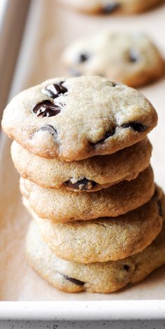 chocolate chip cookies stacked on top of each other