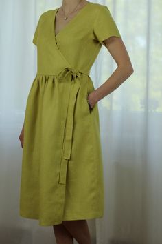 "Spring dress, Write the selected color in the message Handmade yellow wrap dress with short sleeves, 2 pockets and belt , perfect for casual wear and suitable for any occasion in any season Details: - 100% natural linen produced in Europe ; - medium weight (180 gram per square meter); - color: yellow, could be any from our colors catalog (color samples at the photo); Made to order, approximately a few days, If you have any questions please message me and I will be glad to answer. Size guide : S Casual Wrap Dress, Cotton Dress Indian, Yellow Wrap Dress, Wrap Dress Casual, Linen Casual Dress, Linen Summer Dress, Womens Wrap Dress, Linen Dress Women, Kurta Neck Design