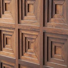 a close up view of some wooden doors