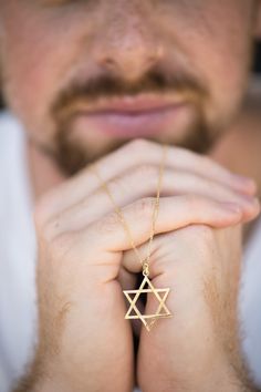 Ready to ship-Minimalistic Star of David gold pendant necklace man gift, classic and timeless gift for your man, beautifully handmade piece, also perfect as a Bar Mitzva present to show and to carry close to you your connection and bond to the Jewish tradition. ❤ Specifications: * Magen David size: 3.30x3.30 cm * 14K yellow gold * Available also in White Gold (please choose from the dropdown menu) * Solid gold chain length: 16, 17, 18' Inch (please choose from the dropdown menu) ❤Each order will Minimalist 14k Gold Star Of David Necklace, Gold Engraved Star Of David Necklace, 14k Gold Star Of David Jewelry Gift, 14k Gold Star Of David Necklace Gift, Gift 14k Gold Star Of David Necklace, Minimalist Gold Necklace With Star Of David, Minimalist Yellow Gold Star Of David Necklace, Brass Necklace For Gift, Gold Star Of David Necklace Gift