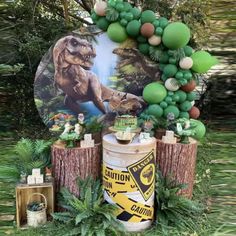 an image of a birthday party with balloons and decorations for a t - shirt dinosaur theme