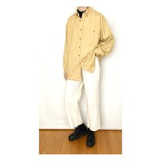 Muted light mustard yellow cotton button-up. Medium weight - could be worn as a light jacket. Material : unmarked (feels like 100% cotton) Brand : Medal Play Tag Size : M (mens) Best Fit : S to M (mens) or S to L (womens) Era : 90s Condition : very good - middle buttonhole has some mild fraying (see last pic), but functionally fine; mild overall wear Care : machine wash MEASUREMENTS (taken flat) Shoulder Width : 20" Bust / Chest : 23" | 46" around Bottom Hem / Hip : 23.5" | 47" around Length : 2 Casual Mustard Cotton Outerwear, Vintage Cream Cotton Shirt, Cream Vintage Cotton Shirt, Mustard Long Sleeve Casual Shirt, Casual Yellow Cotton Outerwear, Mustard Long Sleeve Cotton Shirt, Vintage Yellow Shirt For Work, Vintage Yellow Cotton Outerwear, Light Mustard Yellow