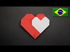 an origami heart with the flag of brazil