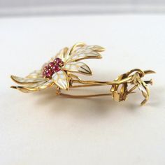 "IMPORTANT: A description is available following the details. Please, read on. Thank you. Material: 18K solid gold, enamel plique à jour, rubies Size: 65mm x 43mm (2 5/8\" x 1 3/4\") Weight: 19.9g Period: Art Nouveau Style: brooch, clip-on, pin Origin: France Provenance: a French estate condition: excellent estate. Very minor wear additional remarks: stamped with the French eagle head assay mark N.b.: We guarantee the authenticity of our items. Each one of them has been evaluated by our experts Yellow Gold Enamel Brooches, Yellow Gold Enamel Brooches Hallmarked, Luxury Gold Enamel Brooch, Luxury Gold Enamel Brooches, Yellow Gold Enamel Brooch Jewelry, Elegant Enamel Brooch Pin, Art Nouveau Enamel Brooch Jewelry, Elegant Yellow Gold Enamel Brooches, Elegant Yellow Gold Enamel Pin Gift