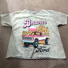 a gray shirt with an image of a truck on it and the words brano ford