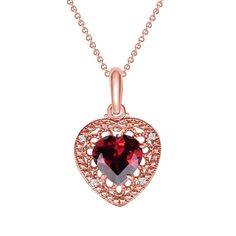 A Heart-Shaped Garnet and Diamond Filigree Charm Pendant Necklace is a stunning piece of jewelry that combines the rich, deep red hue of garnet with the dazzling sparkle of diamonds. The filigree design adds an element of intricate beauty, making this pendant a perfect gift for a loved one or a cherished addition to your own jewelry collection. Product Information • Metal: 10k or 14k in Yellow/Rose/White Gold• Weight: 10k - 1.3 g. | 14k - 1.4 g. • Dimensions: 0.7" inches x 0.5" inches • Center Stone: Genuine Garnet, Heart-Shaped, 7 x 7 mm, 1.2 cts (approx.) • Side Stones: Diamond, Round-Shaped, 1 mm, 0.20 cts (approx.)• Chain: Rolo Chain with Spring Ring Clasp - 1 g. SKU: QM1759 Ruby Heart Pendant Necklace For Wedding, Heart-shaped Ruby Gemstone Necklace, Ruby Heart Cut Gemstone Necklace, Heart Cut Ruby Gemstone Necklace, Elegant Yellow Gold Garnet Necklace, Elegant Garnet Necklace For Formal Occasions, Ruby Heart Pendant Jewelry For Valentine's Day, Ruby Pendant Jewelry For Valentine's Day, Fine Jewelry Ruby Necklace For Valentine's Day